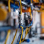 A photograph of a lighting contractor working on a one-way switch installation
