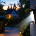 A photograph of a motion detector floodlight installed in an outdoor setting
