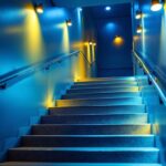A photograph of a well-lit stairway featuring energy-efficient lighting solutions