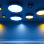 A photograph of a well-lit room showcasing various recessed light fixtures in different sizes and styles