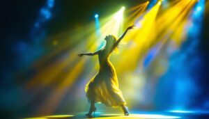 A photograph of a dynamic dance performance illuminated by vibrant stage lighting