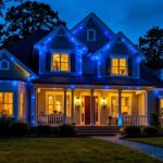 A photograph of a beautifully illuminated house at dusk