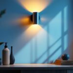 A photograph of a stylish uplight wall sconce installed in a modern interior setting