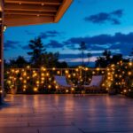 A photograph of a beautifully lit outdoor space featuring solar outdoor led rope lights elegantly draped along a patio