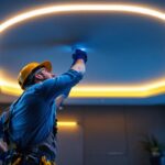 A photograph of a modern ceiling light strip installation in a stylish interior setting