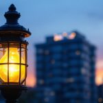 A photograph of a vintage gaslight illuminating a modern urban setting at dusk