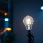 A photograph of a 200-watt lamp in a well-lit environment
