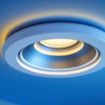 A photograph of a close-up view of a stylish 6-inch recessed light trim installed in a modern ceiling