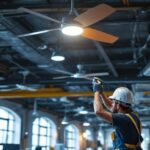 A photograph of capture a photograph of a well-lit industrial space featuring stylish ceiling fans in action