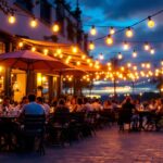 A photograph of a beautifully illuminated outdoor cafe setting at dusk