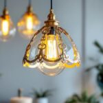 A photograph of a beautifully designed gold and silver pendant light hanging in a stylish interior setting