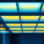 A photograph of a modern drop ceiling installation featuring sleek recessed lights