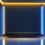 A photograph of a modern corner light wall installation in a stylish interior setting