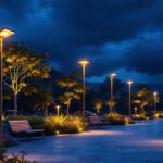 A photograph of a beautifully illuminated outdoor space featuring tall solar lights in various settings