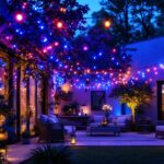 A photograph of a beautifully illuminated outdoor space featuring vibrant color-changing led string lights draped elegantly across a patio or garden