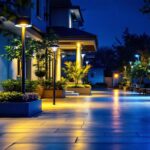 A photograph of a well-lit outdoor space featuring various types of security lighting installations