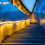 A photograph of a beautifully illuminated stairwell featuring stylish ceiling lights that enhance the space's ambiance