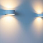 A photograph of a well-lit interior wall featuring stylish led wall lights