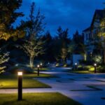 A photograph of a beautifully illuminated outdoor landscape featuring various types of landscape flood lights in action