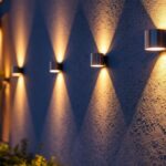 A photograph of a beautifully lit exterior wall featuring a variety of stylish wall-mounted led lights