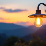 A photograph of a beautifully illuminated dusk to dawn light fixture in an outdoor setting