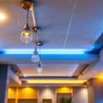 A photograph of a well-lit drop ceiling installation showcasing various lighting options