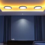 A photograph of a beautifully designed interior space showcasing five sleek led recessed lights installed in the ceiling