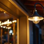 A photograph of a stylish gooseneck sign light fixture elegantly illuminating a charming storefront or outdoor signage at dusk