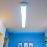 A photograph of capture a photograph of a well-lit interior space featuring a vibrant led t8 tube light installed in a ceiling fixture