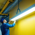 A photograph of a well-lit commercial space featuring a 2x4 fluorescent fixture in action