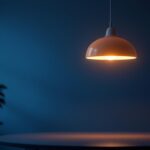 A photograph of a stylish round pendant lamp elegantly illuminated in a modern interior setting