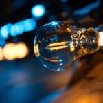 A photograph of a type b base light bulb illuminated in a well-designed lighting setup