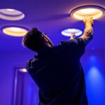 A photograph of a well-lit interior space featuring recessed led can lights