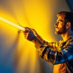 A photograph of a lighting contractor skillfully installing led tube strip lights in a modern interior setting