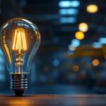 A photograph of a sleek 277-volt led light bulb illuminated in a modern industrial setting