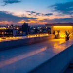 A photograph of a beautifully illuminated rooftop featuring stylish led lighting installations