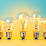 A photograph of a close-up view of various standard light bulb bases