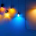 A photograph of a well-lit room showcasing various types of can lights with different light bulb options installed