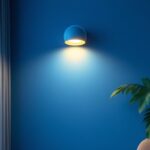 A photograph of a stylish surface-mounted lamp installed in a modern interior setting