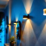 A photograph of a modern indoor space featuring stylish led wall lamps
