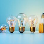 A photograph of a close-up shot of various light bulb bases