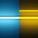 A photograph of a side-by-side comparison of t12 and t8 fluorescent light tubes