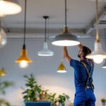 A photograph of a well-lit workspace featuring a variety of stylish ceiling lights