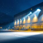 A photograph of a 1000w metal halide light installation illuminating a large outdoor area