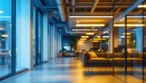 A photograph of a modern office space illuminated by sleek led light fixtures