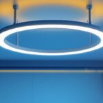 A photograph of capture a photograph of a beautifully designed circular lighting track installed in a modern interior space