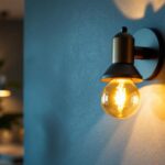 A photograph of a beautifully designed wall-mounted lighting fixture in a stylish interior setting