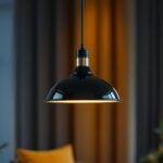 A photograph of a stylish black pendant light hanging in a modern interior setting