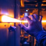 A photograph of a lighting contractor installing or showcasing a uv tube light in a well-lit workspace