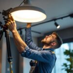 A photograph of a close-up of a glowing light bulb in a dimly lit environment